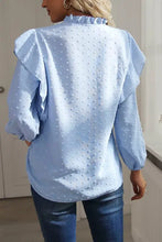 Light blue swiss dot ruffled long sleeve blouse with lace trim