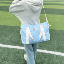 Light Blue Textured Duffel and Tote Travel Bag with White Straps Travel Bags