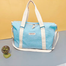 Light Blue Textured Duffel and Tote Travel Bag with White Straps Travel Bags