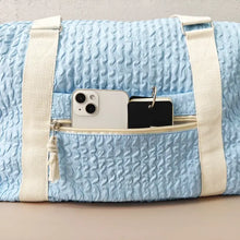 Light Blue Textured Duffel and Tote Travel Bag with White Straps Travel Bags