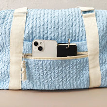 Light Blue Textured Duffel and Tote Travel Bag with White Straps Travel Bags