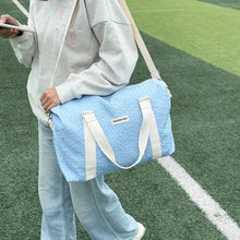 Light Blue Textured Duffel and Tote Travel Bag with White Straps Travel Bags