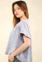 Light blue washed knit fabric top with notched short sleeve