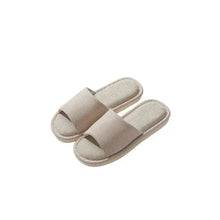 Pair of light brown striped open toe flats slippers with beige ribbed design