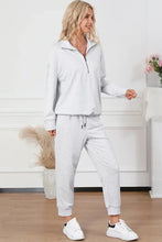 Light gray drawstring sweatpants set with half zip sweatshirt long sleeves