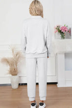 Light gray drawstring sweatpants set with long-sleeve half zip sweatshirt