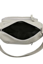 Light gray leather crossbody bag with silver details and zippered compartments