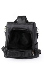 Black leather zipper backpack with adjustable straps and zipper closure
