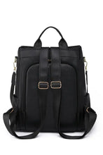 Light gray zipper backpack with adjustable straps and multiple pockets