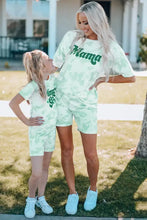 Mint green printed letter graphic lounge set with camo shorts and sneakers