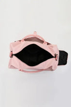 Light pink nylon crossbody duffel bag with top handles