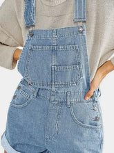 Light wash pocketed square neck wide strap denim overalls shorts