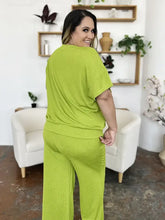 Lime green plus size short sleeve texture round neck top with wide leg pants