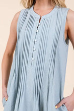 Light blue sleeveless midi dress with vertical denim pintuck pleats and white buttons down the front by Lime N Chili