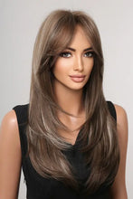 Long synthetic hair wig with blonde highlights and bangs
