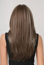 Long synthetic hair wig with layered brown and blonde highlights