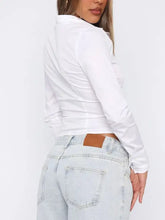 White long sleeve button-down shirt with fitted, slightly cropped silhouette for a polished look