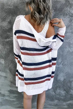 Striped knit sweater dress in navy, white, red, orange with long sleeves and V-neck