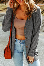 Long sleeve charcoal gray cardigan with pockets and relaxed fit