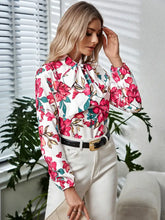Long sleeve floral blouse with tie neck and pink flowers on cotton