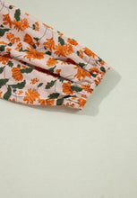 Orange floral headband with elastic for boho babydoll mini dress