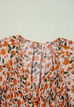 Peach floral blouse with orange green accents in lightweight boho babydoll mini dress style