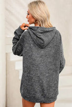 Women’s dark gray long sleeve hooded sweatshirt with front pocket