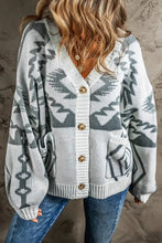 Long sleeve grey and white geometric Aztec cardigan with gold buttons