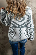 Long sleeve Aztec cardigan sweater in gray-white knit with gold buttons