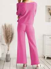 A vibrant pink long sleeve lounge top and drawstring pants set in soft stretchy fabric with loose sleeve length