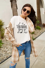 Simply Love white round neck t-shirt with long-sleeve plaid shirt over jeans