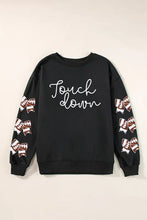 Long sleeve sweatshirt with graphic bow and black touch down dice sleeves
