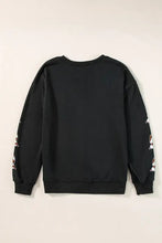 Long sleeve sweatshirt with graphic bow and floral football print on black sleeves