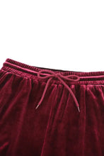 Maroon velvet pants with elastic waistband and matching drawstring designed for natural waistline in lounge set
