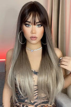 Long straight synthetic wig with ombre brown roots, blonde tips, bangs, heat safe
