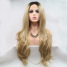 Long wavy heat safe blonde wig with dark roots on mannequin head