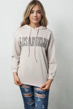 Beige long-sleeved Los Angeles graphic hoodie with leopard print chest