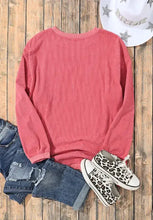 Dusty rose love round neck long sleeve sweatshirt with coral ribbing, leopard sneakers, distressed shorts