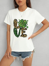 White LOVE Round Neck Short Sleeve T-Shirt with leopard print, green plaid, and shamrocks