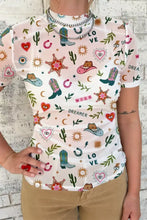 White short-sleeved love wild dreamer sheer mesh top with wild dreamer western print of boots hats stars and cacti