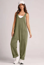 Olive green Lovelet wide strap jumpsuit with V-neckline and rolled cuffs