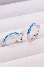 Silver hoop earrings with blue opal inlays and matching box