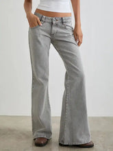 Low rise flare leg jeans in light gray denim with a wide-leg flared fit and classic five-pocket design