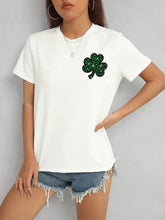 White lucky clover round neck short sleeve t-shirt with green shamrock print