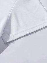 Close-up of white Lucky Clover Round Neck T-Shirt fabric with visible stitching