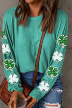Teal sequin round neck sweatshirt with shamrock appliques