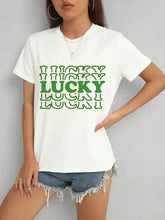 White Lucky Round Neck Short Sleeve T-Shirt with Green LUCKY Text and Denim Shorts