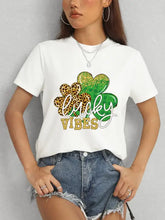 White Lucky Vibes short sleeve round neck t-shirt with shamrock graphic