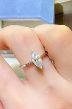 Marquise-cut sterling silver engagement ring with solitaire diamond