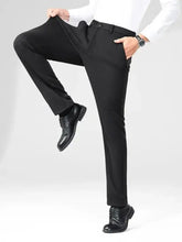 Mens basic style slim fit pants in black stretch fabric with flat front